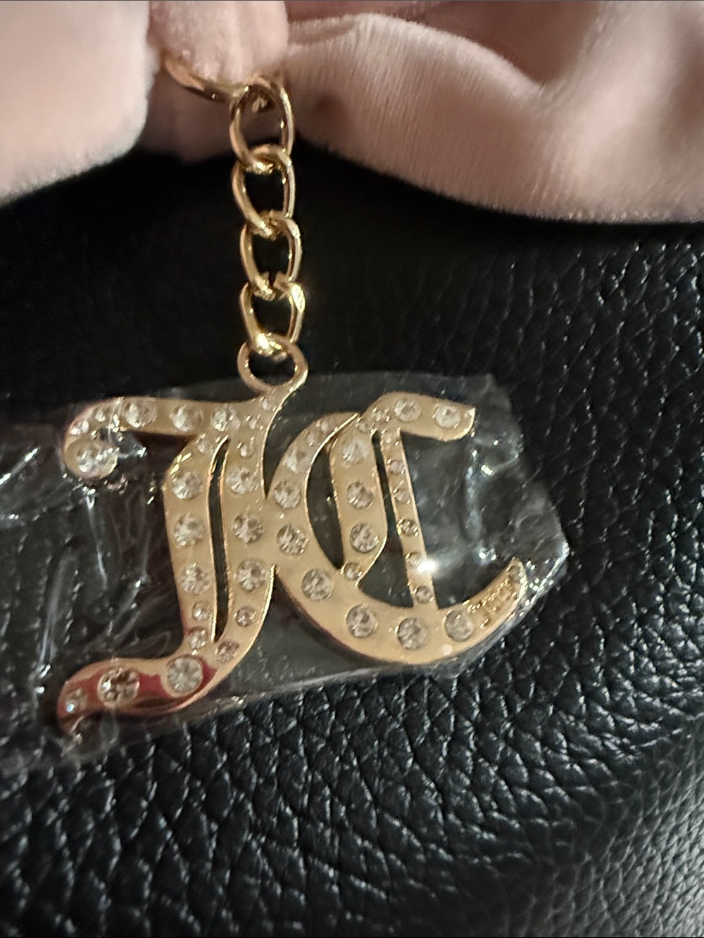 Juicy Couture kisslock handbag w/a prominent blush pink bow and pearl charm.$108 - Picture 9 of 10